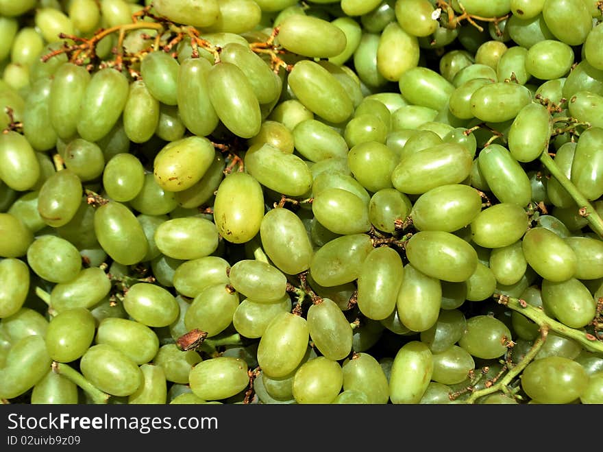 Green grape clusters in a market. Green grape clusters in a market