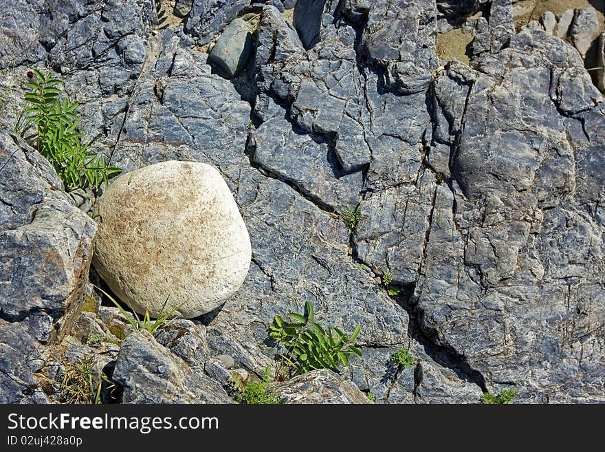 Abstract stone background with round white stone