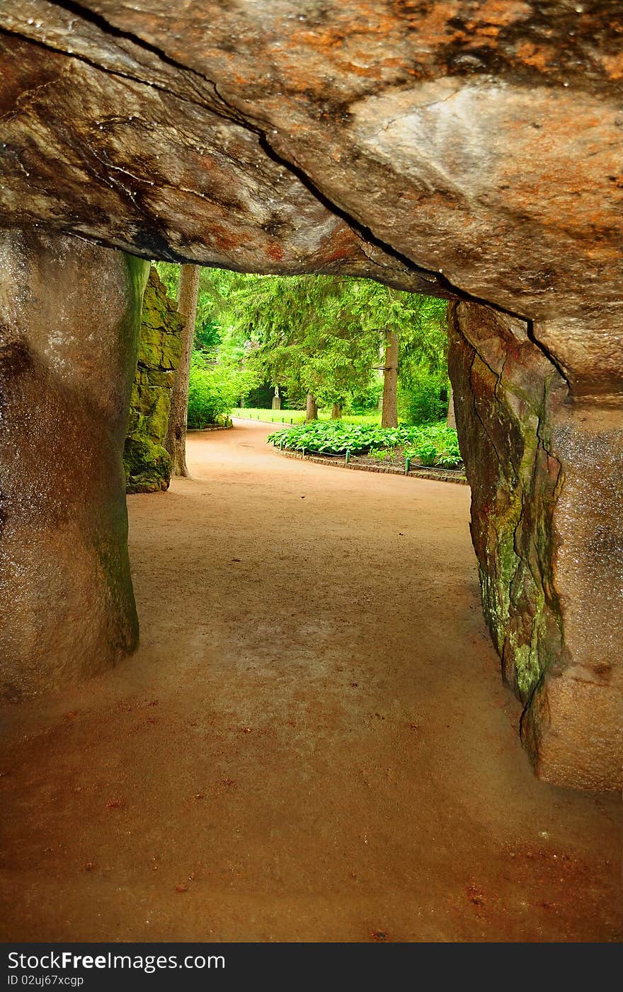 Winding path through park avenue with sun beams