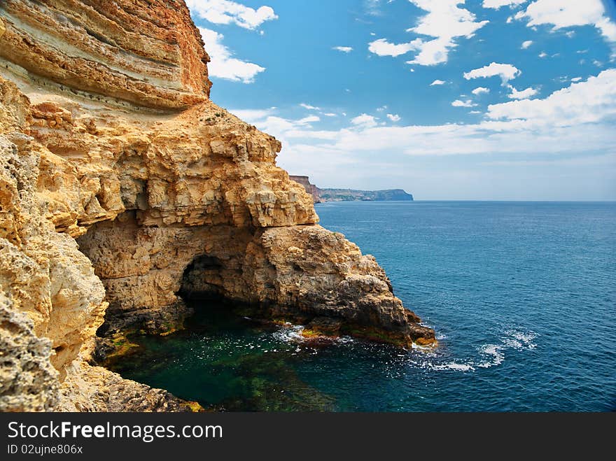 Cave in rock at the sea. Nature composition. Cave in rock at the sea. Nature composition.