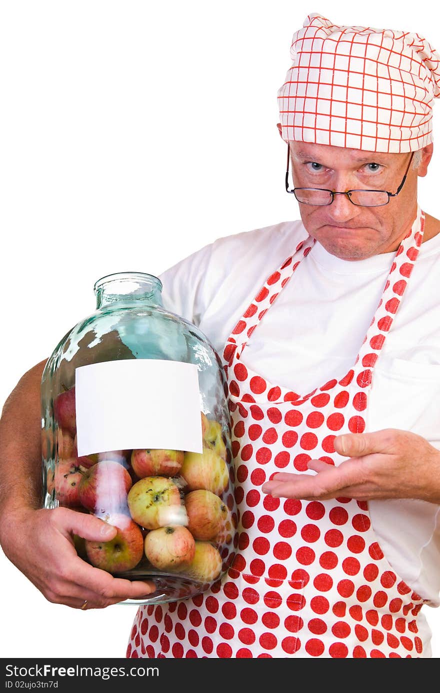 A man holding huge jar filled with apples. Label with clipping path. A man holding huge jar filled with apples. Label with clipping path