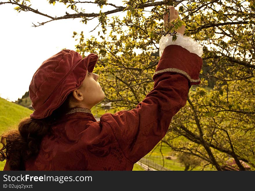 I made this photo with medieval clothes, in a deserted house in the village fund-Bran. Here I wanted to represent a duke which is smelling the beautiful tree flowers. I made this photo with medieval clothes, in a deserted house in the village fund-Bran. Here I wanted to represent a duke which is smelling the beautiful tree flowers.