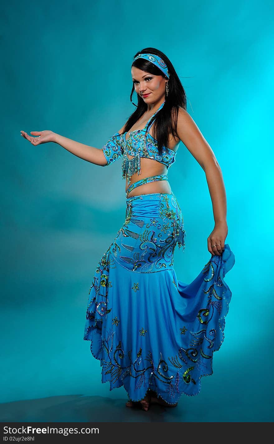 Beautiful dancer woman in bellydance costume with pretty professional stage make-up. Beautiful dancer woman in bellydance costume with pretty professional stage make-up