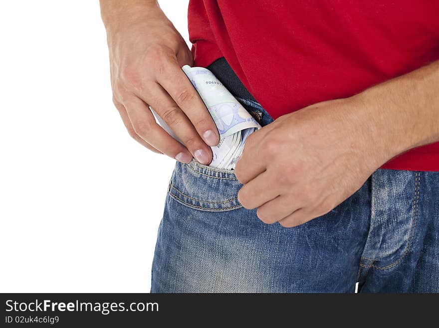 Man putting money into the pocket. Man putting money into the pocket