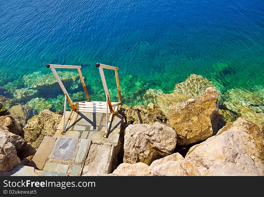 Stairs to sea - vacation beach background