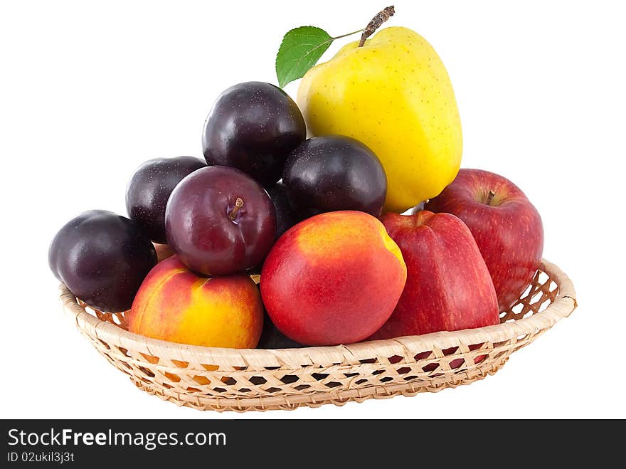 Ripe Juicy Fruit In A Wicker Vase