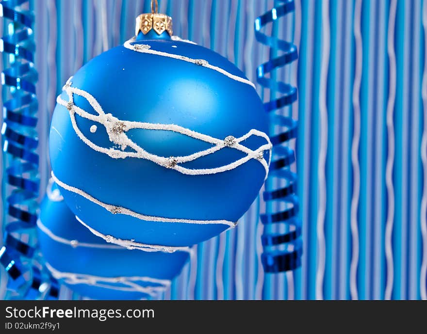 Christmas decoration from two blue balls on blue background. Christmas decoration from two blue balls on blue background