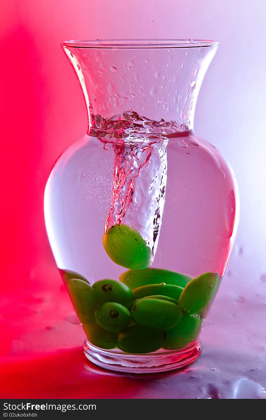 green Grape drops in water