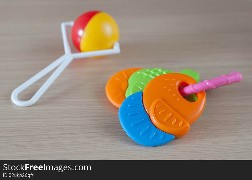 Two tiny plastic rattles for baby