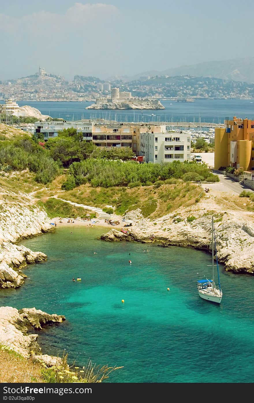 Bay on the island Frioul with look onto the Chateau dIf and on Marseille