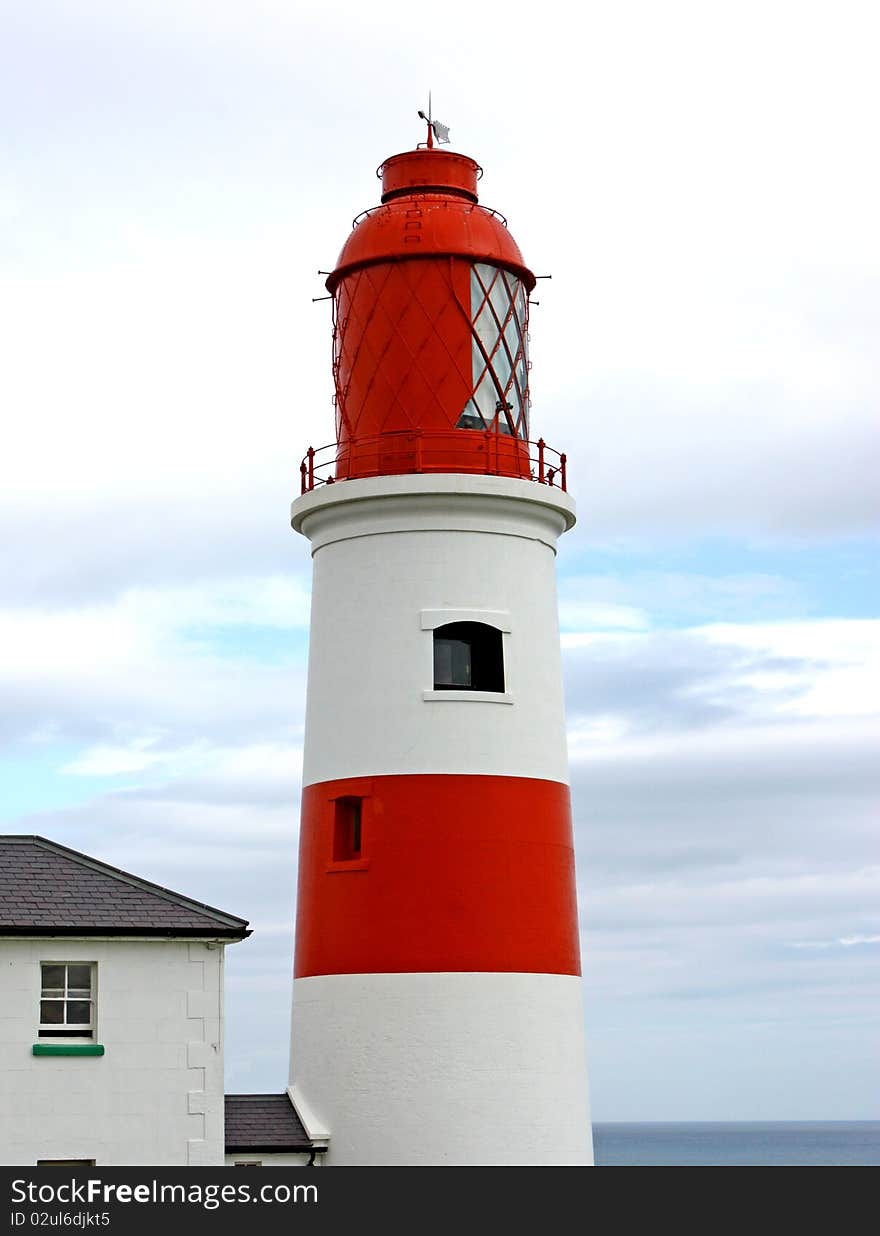 A Traditional British Red and White Lighthouse. A Traditional British Red and White Lighthouse.