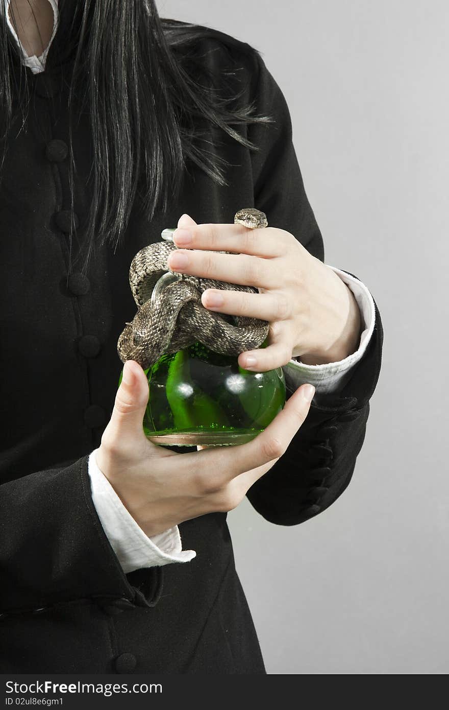 The Person Hold Poison With A Snake