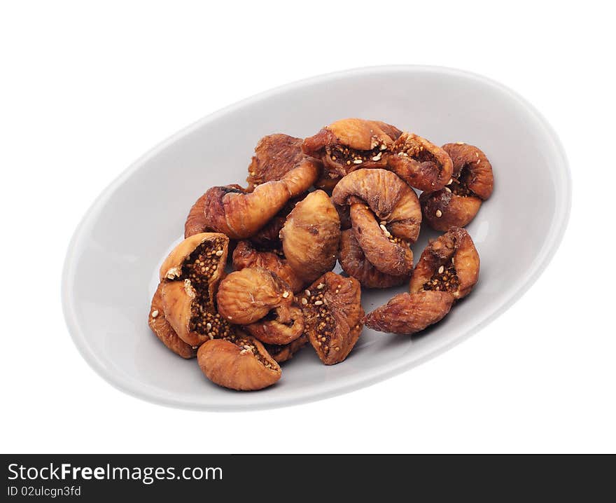 Dried figs isolated over white background