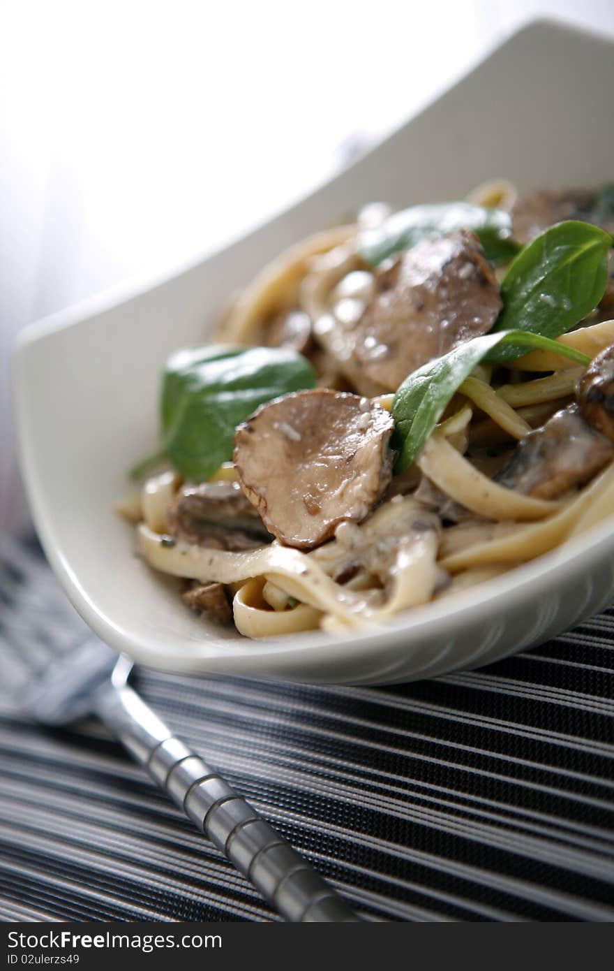 A tasty meal of pasta and pork taglietelle carbonara