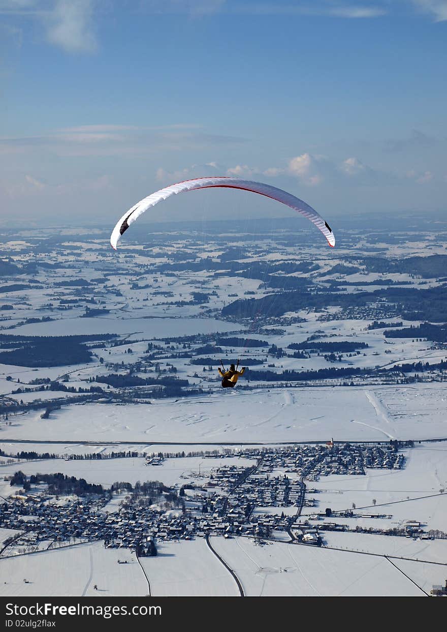 Paraglider flying over a valley in germany