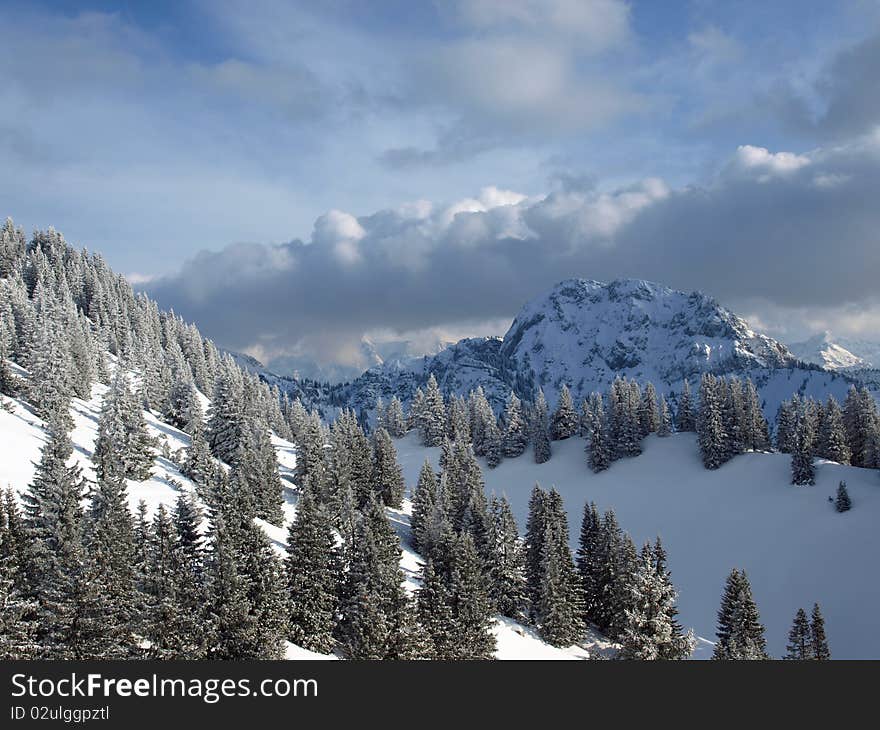 Alps close to the castle neuschwanstein in germany on a beautiful sunny winterday. Alps close to the castle neuschwanstein in germany on a beautiful sunny winterday