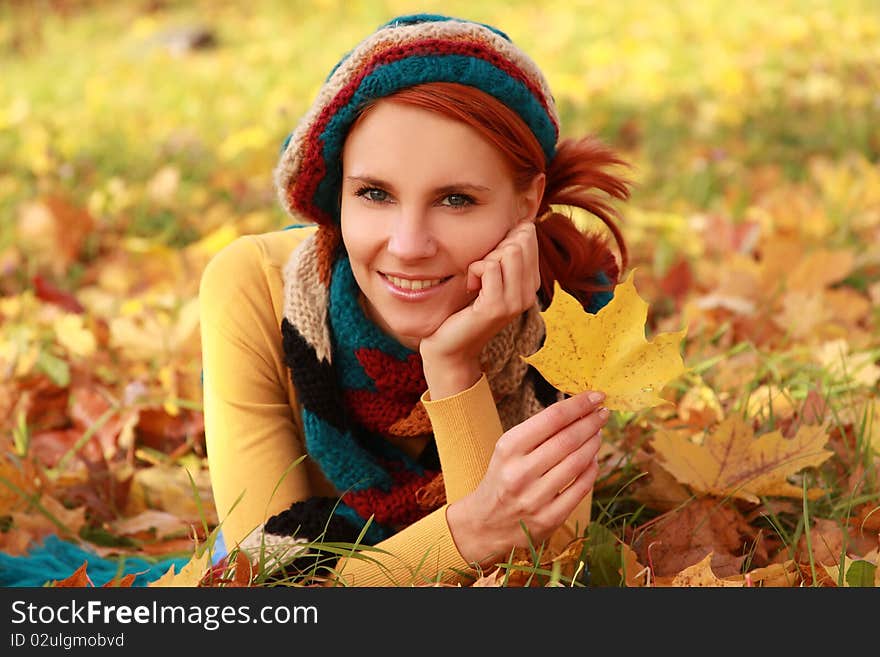 Young girl walking in autumn park. Young girl walking in autumn park