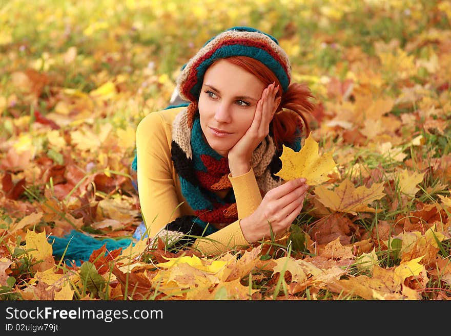 Young girl walking in autumn park. Young girl walking in autumn park