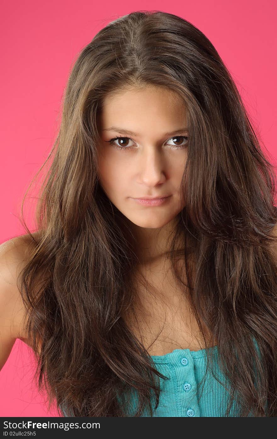 Portrait of a young beautiful model posing on vivid background. Portrait of a young beautiful model posing on vivid background