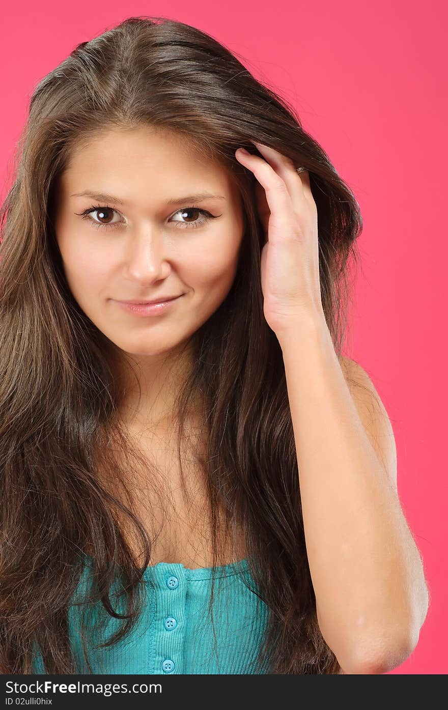 Portrait of a young beautiful model posing on vivid background. Portrait of a young beautiful model posing on vivid background