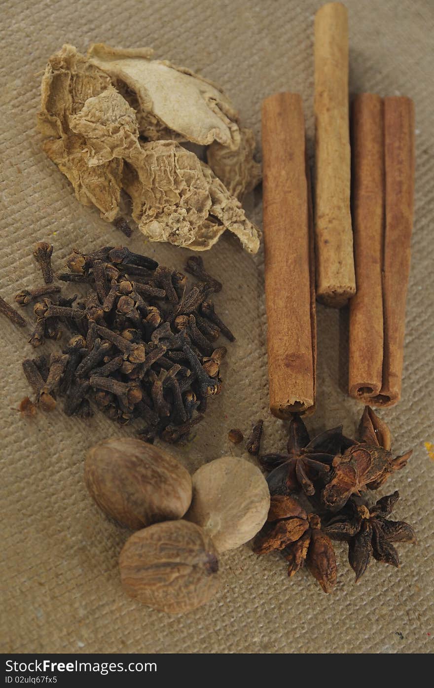 Assorted Spices In Brown Background