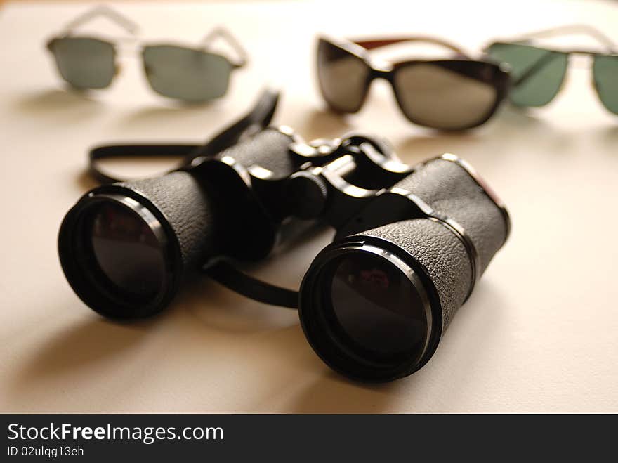 Binoculars and sunglasses