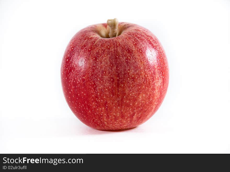 A fresh red and yellow gala apple on a white isolated bacground. A fresh red and yellow gala apple on a white isolated bacground.