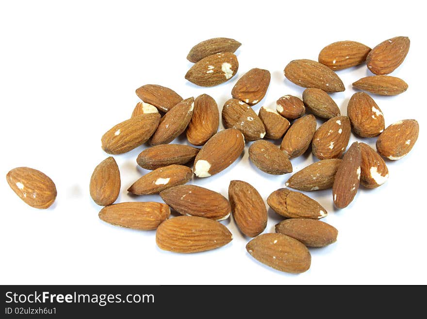 Almonds handful on a white background