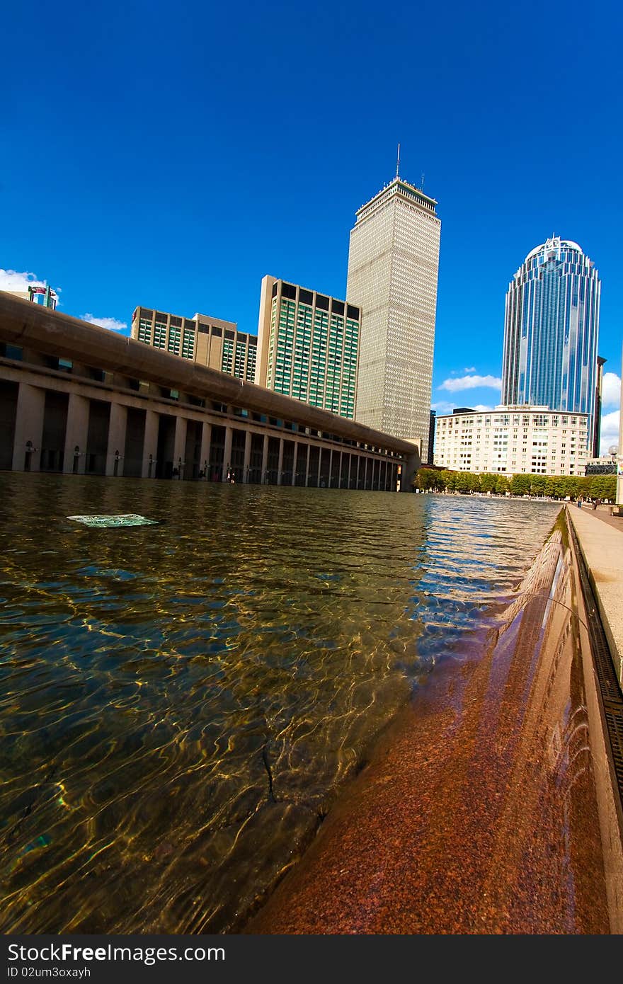 View of Boston Landmark: Prudential Tower and Pond.