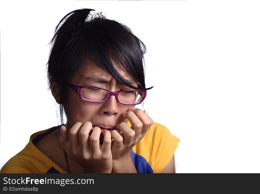 Sobbing asian female teenager with white background. Horizontal view with copyspace. Sobbing asian female teenager with white background. Horizontal view with copyspace.