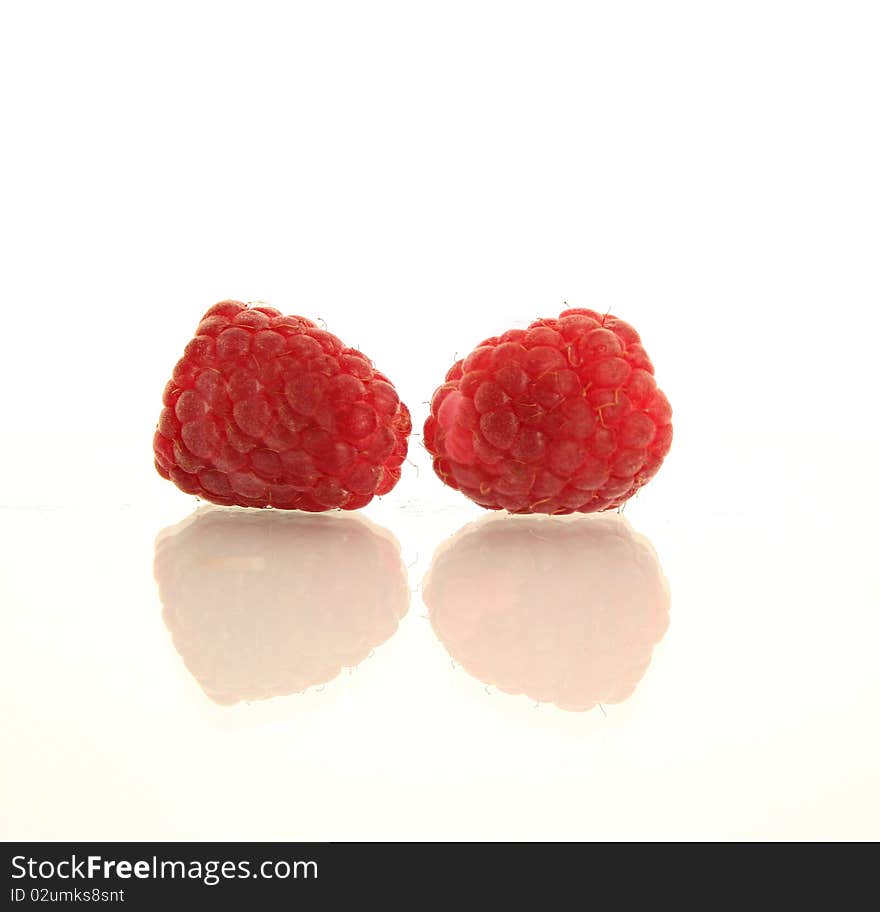 Fresh sweet raspberry isolated on white