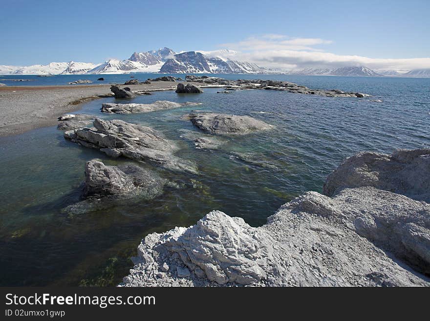 Arctic summer landscape - sea, mountains