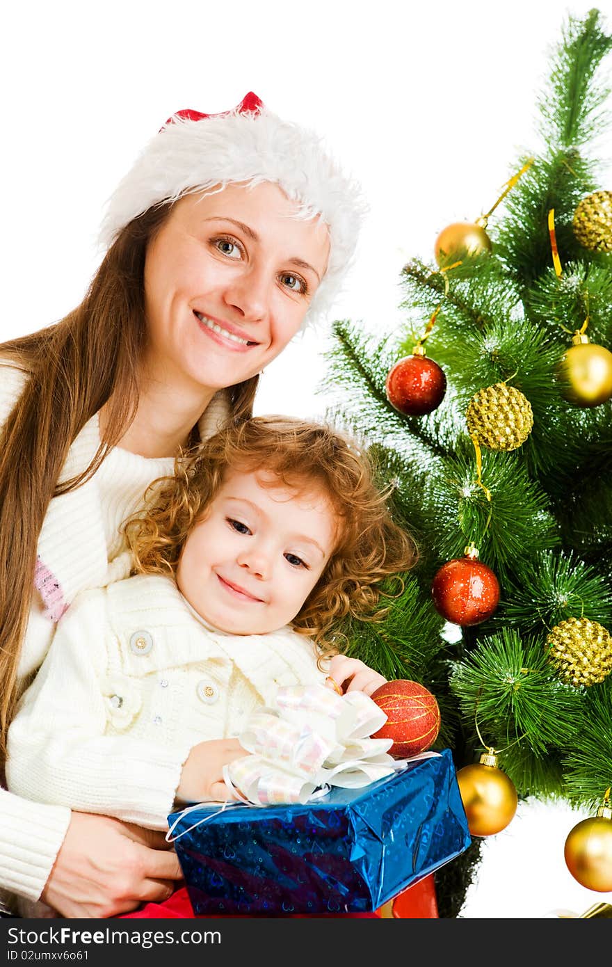 Mother and little daughter holding a present box. Mother and little daughter holding a present box