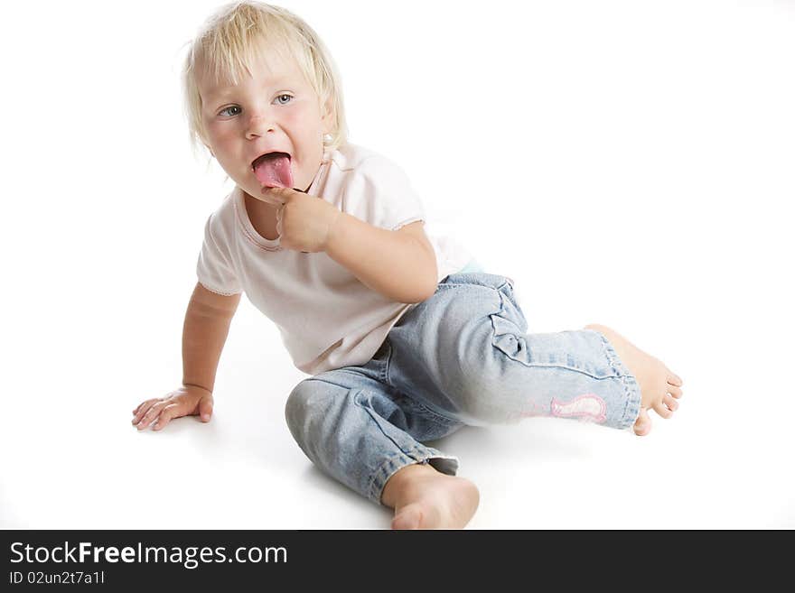 Funny portrait of cute toddler girl over white