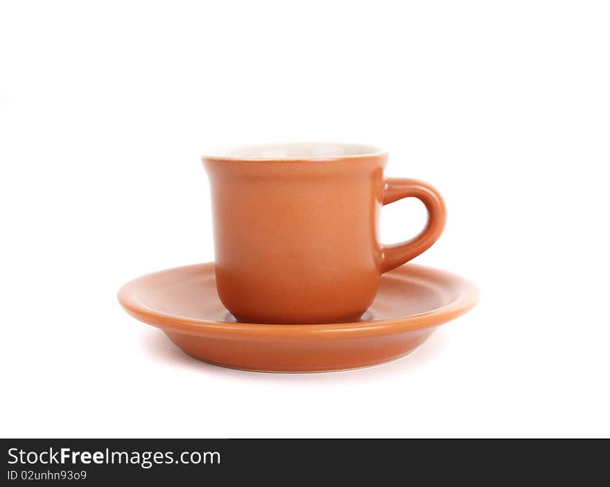 Cup and coffee beans isolated over white