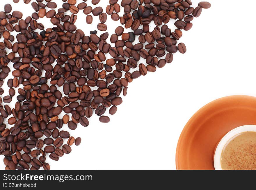 Cup And Coffee Beans Isolated Over White