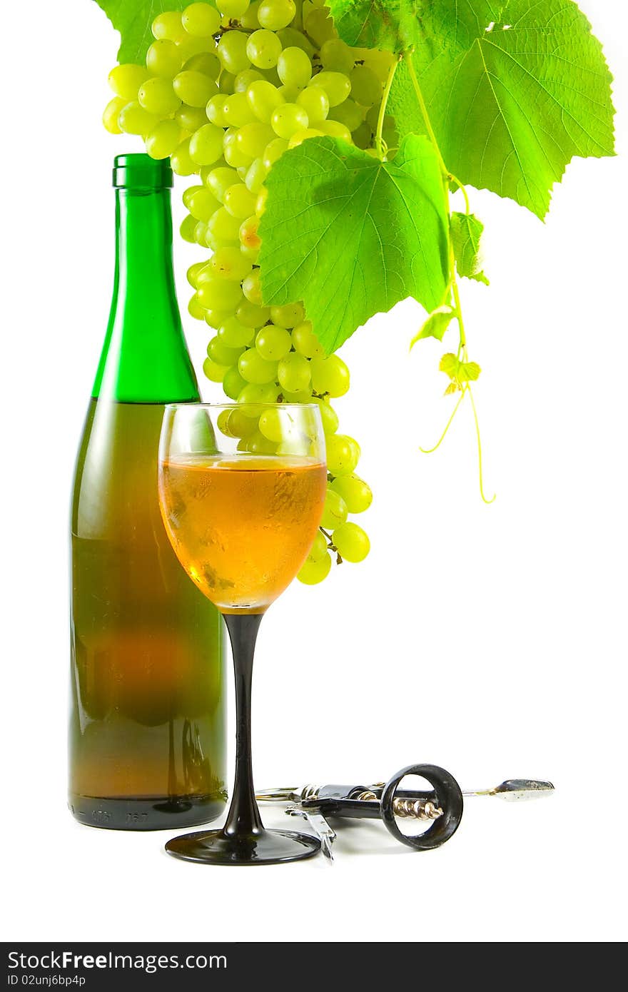 Bottle of wine, glass and grapes isolated on white