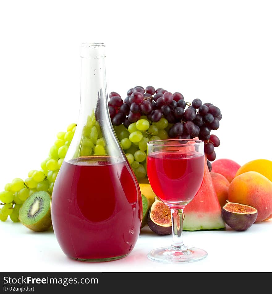 Bottle of wine, glass and fruits isolated on white