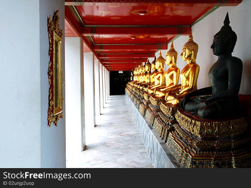 Many of Gold Buddha at Wat Pho. Many of Gold Buddha at Wat Pho