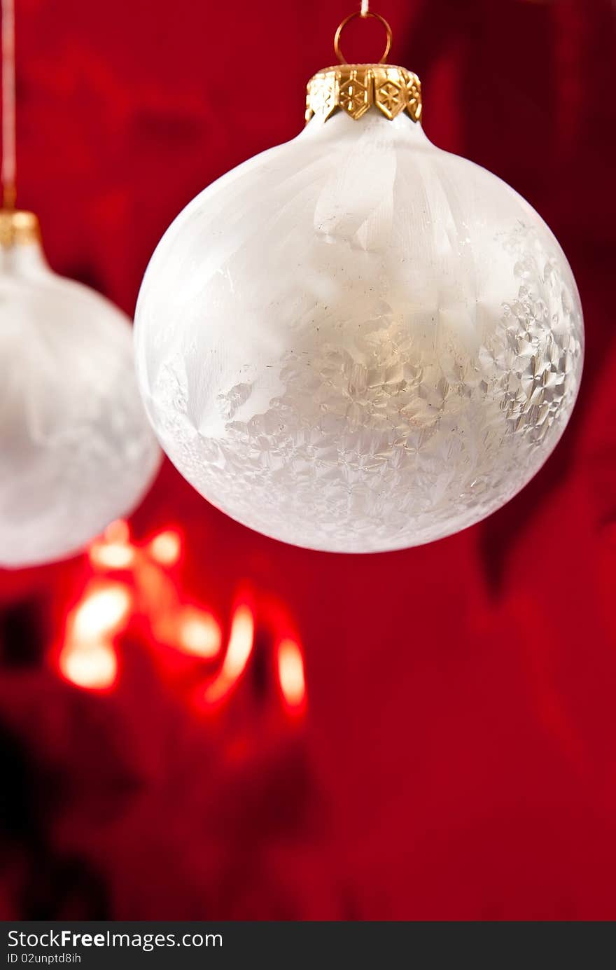 Christmas baubles on red background. studio shot. Christmas baubles on red background. studio shot