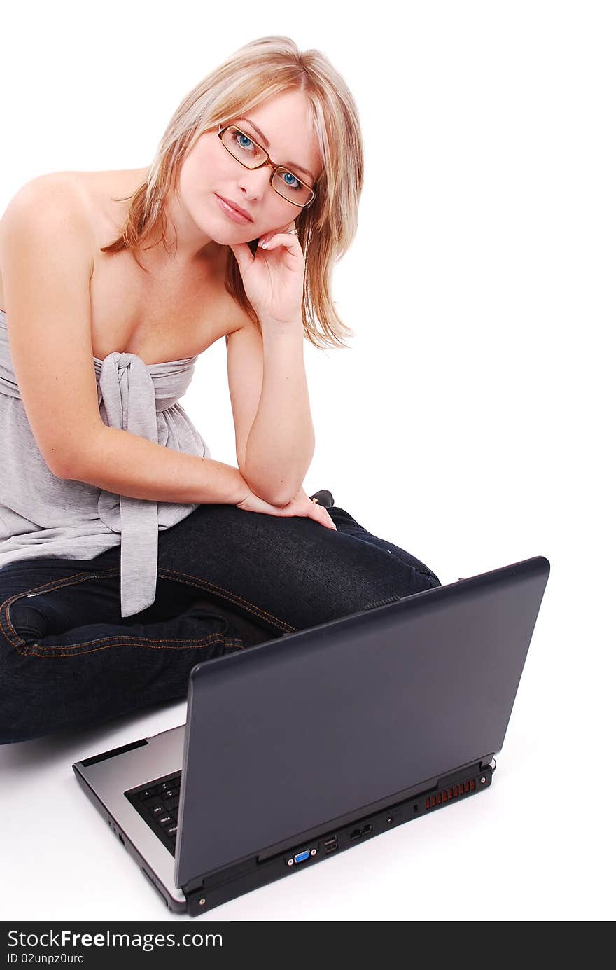 Beautiful young girl working on laptop