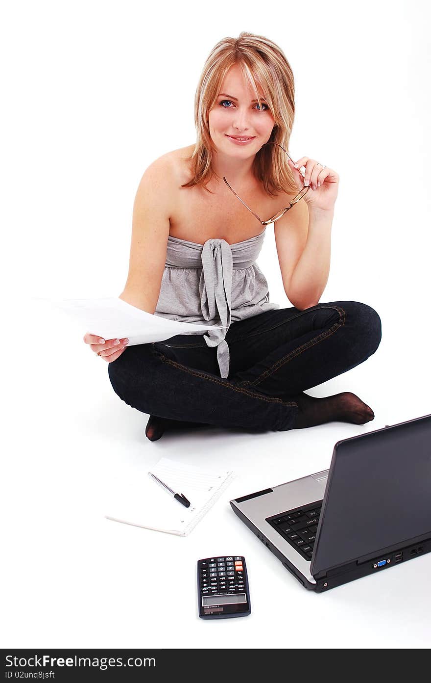 Beautiful young girl working on laptop