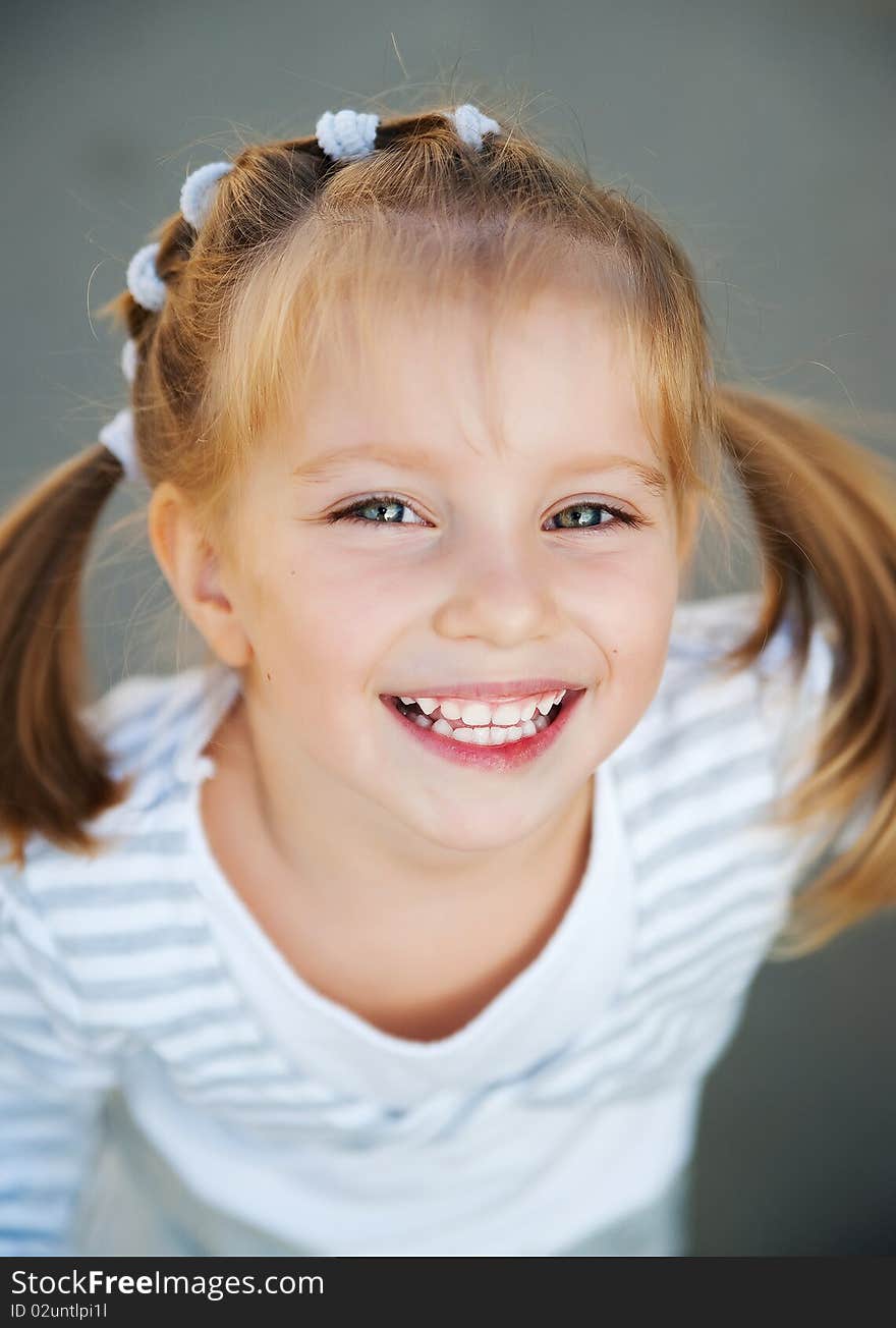 Portrait of a beautiful liitle girl close-up. Portrait of a beautiful liitle girl close-up