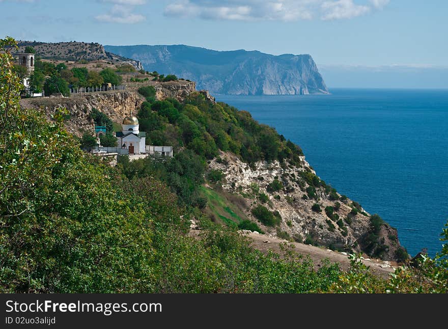 The view of sea coast in Sebastopol, Ukraine with the orthodox monastery on it. The view of sea coast in Sebastopol, Ukraine with the orthodox monastery on it