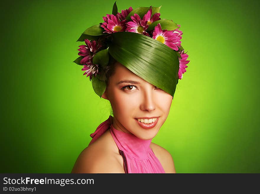 Beautiful spring-woman on green background. Beautiful spring-woman on green background