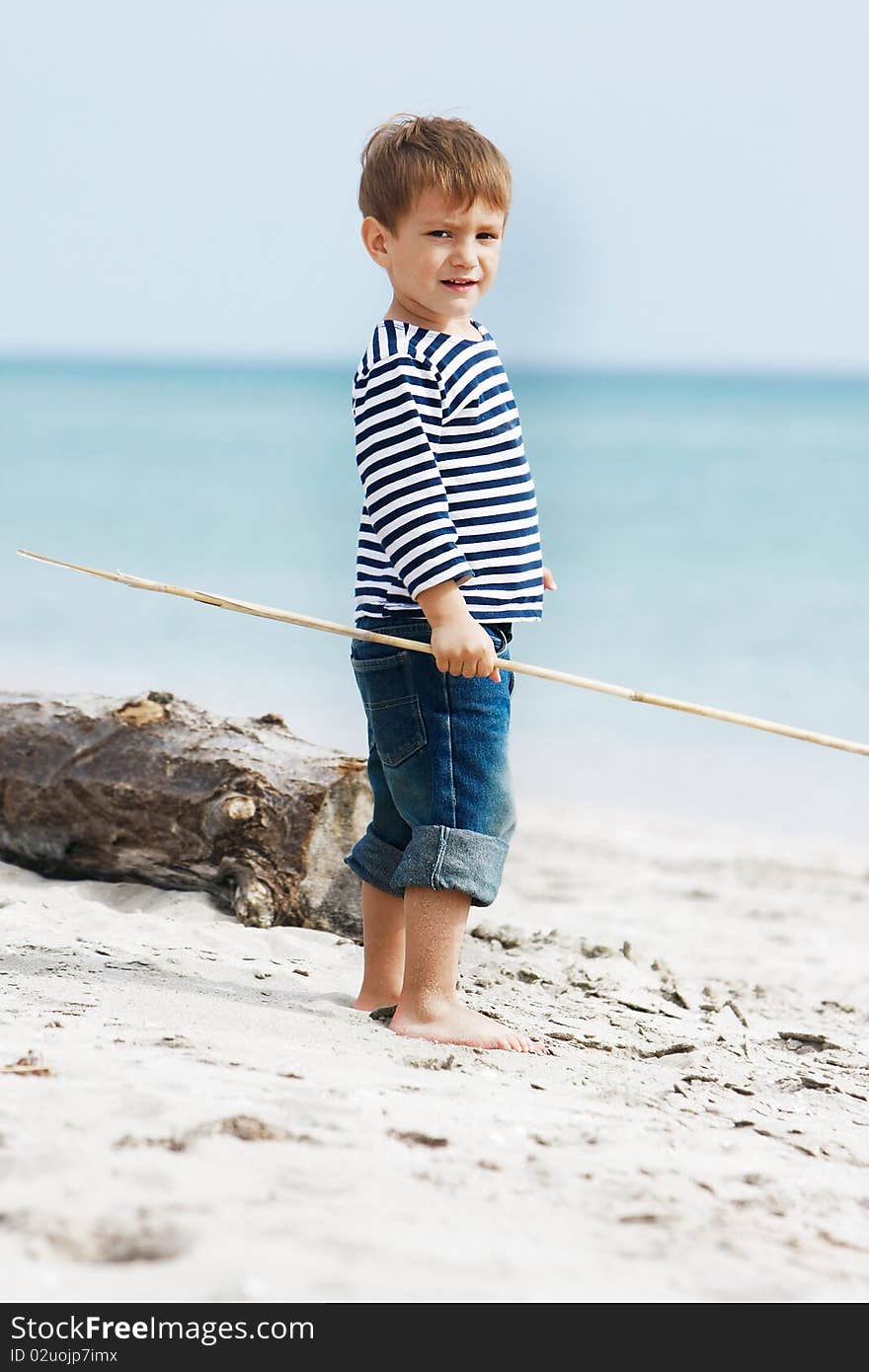 Boy On Sand Beach