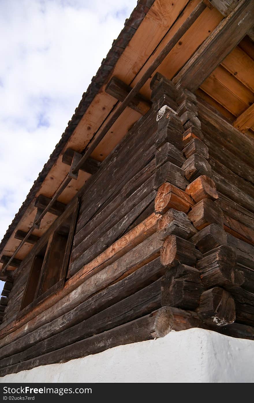 Old traditional wood house, romanian traditional architectural style, life in the countryside.