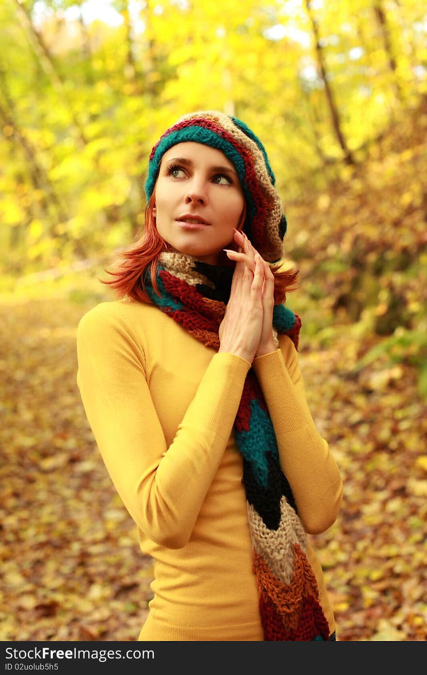 Young girl walking in autumn park. Young girl walking in autumn park