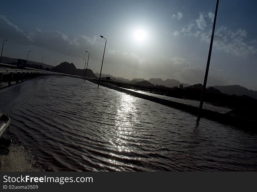 Flooded road after heavy rainfall. Sharm el Sheikh, Red Sea, Egypt. Flooded road after heavy rainfall. Sharm el Sheikh, Red Sea, Egypt.