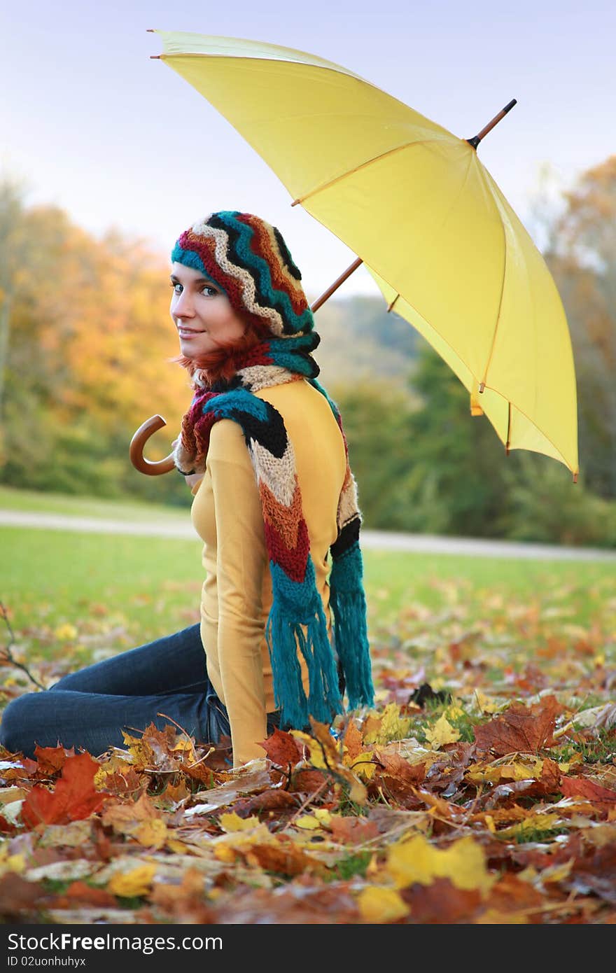 Young girl walking in autumn park. Young girl walking in autumn park